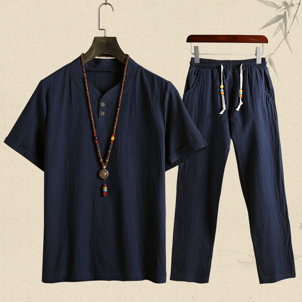 Completo estivo uomo in cotone blu scuro, composto da maglietta a maniche corte e pantaloni con coulisse. Stile casual, ideale per l'estate.