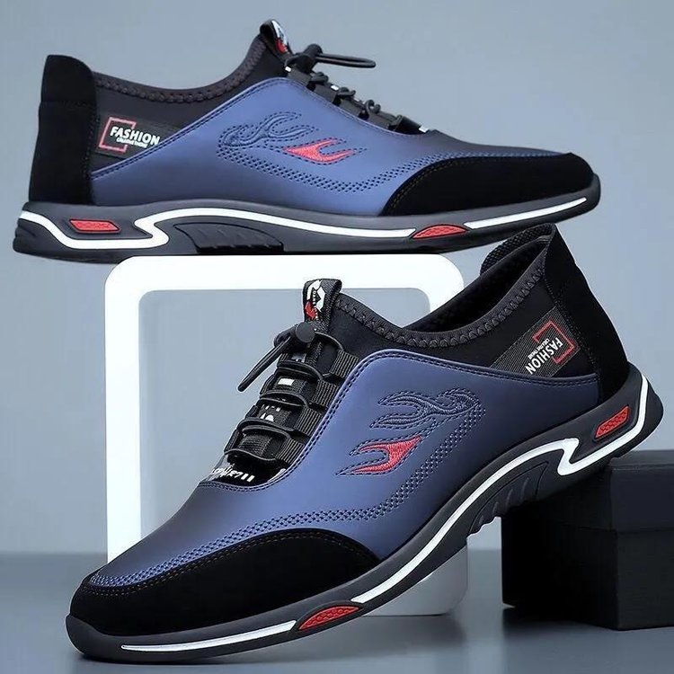 Scarpe sportive da uomo blu e nere, design moderno con suola antiscivolo, dettagli rossi, ideali per corsa e attività all'aperto.