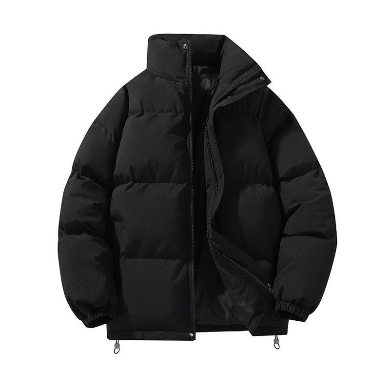 Giacca invernale nera imbottita, design moderno, chiusura a zip, ideale per il freddo. Cappotto caldo e alla moda per uomo e donna.