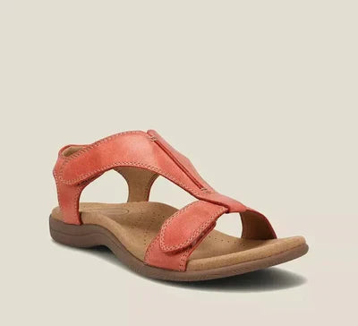 Sandalo da donna in pelle arancione, design aperto, suola ergonomica, ideale per l'estate. Calzature comode e alla moda per passeggiate.