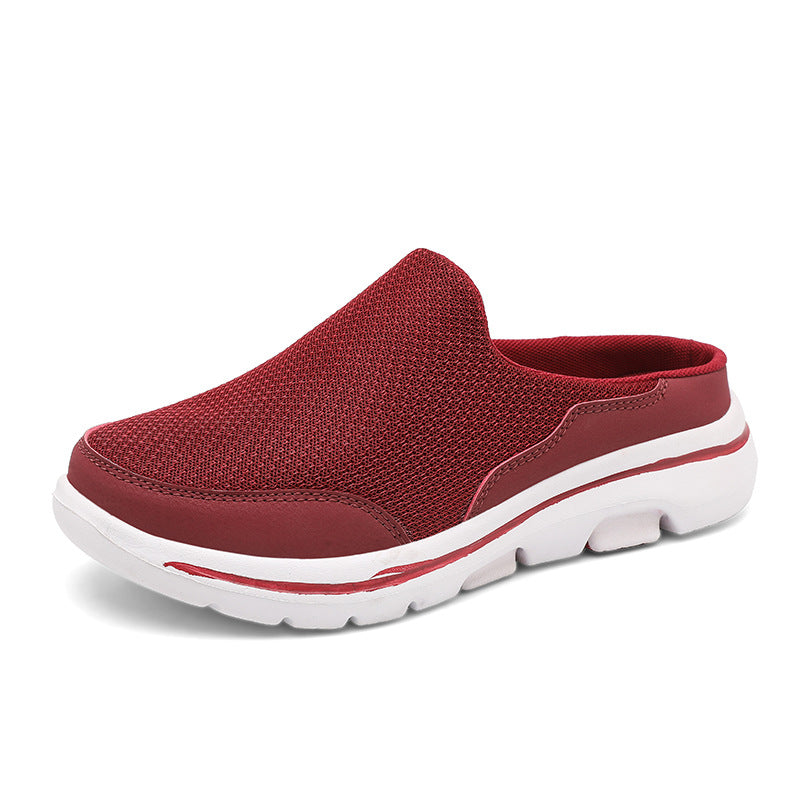 Scarpa slip-on rossa da uomo, design casual con tomaia in tessuto traspirante e suola bianca in gomma. Calzature comode per passeggiate e tempo libero.