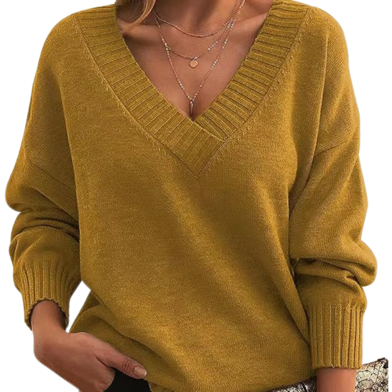 Maglione donna giallo senape con scollo a V, maniche lunghe e dettagli a coste. Stile casual, perfetto per l'autunno e l'inverno.