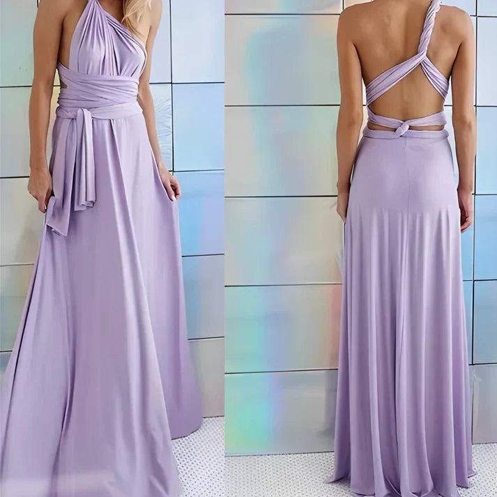Abito lungo elegante in chiffon lilla, design senza spalline con scollo all'americana e schiena scoperta, perfetto per cerimonie e serate speciali.