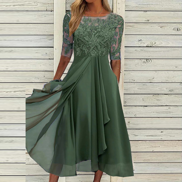 Abito verde elegante in chiffon con dettagli in pizzo floreale, maniche a tre quarti, lunghezza media, perfetto per cerimonie e occasioni speciali.