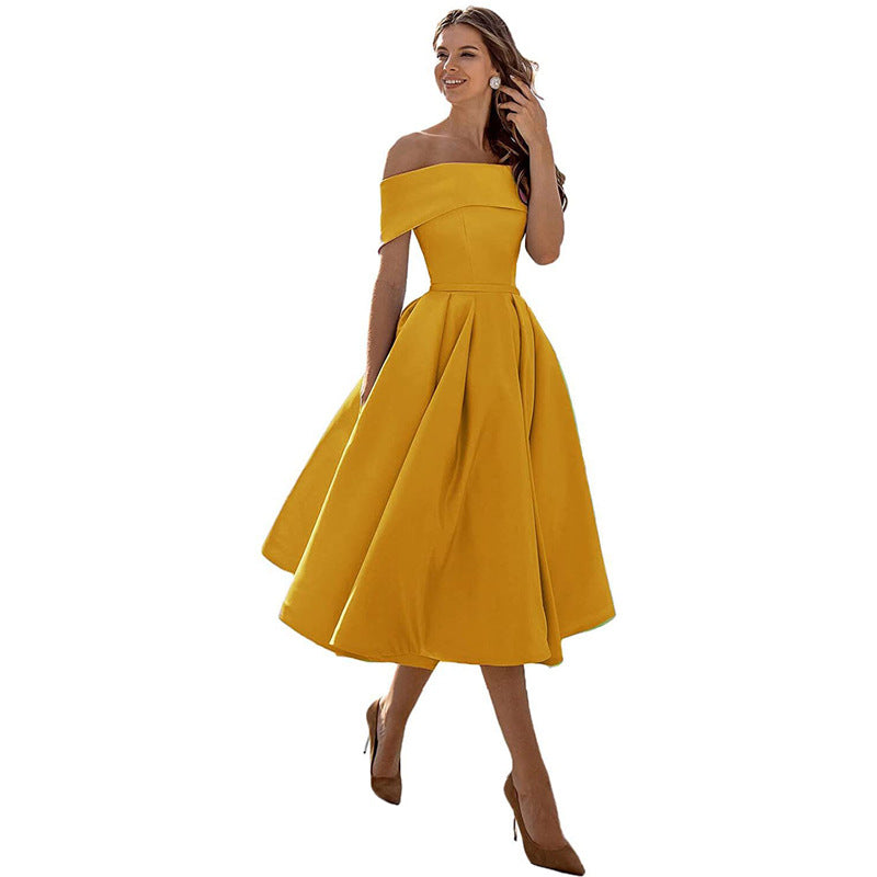 Abito giallo elegante da donna, stile off-shoulder, lunghezza midi, perfetto per cerimonie e serate. Vestito estivo alla moda, tendenza 2023.
