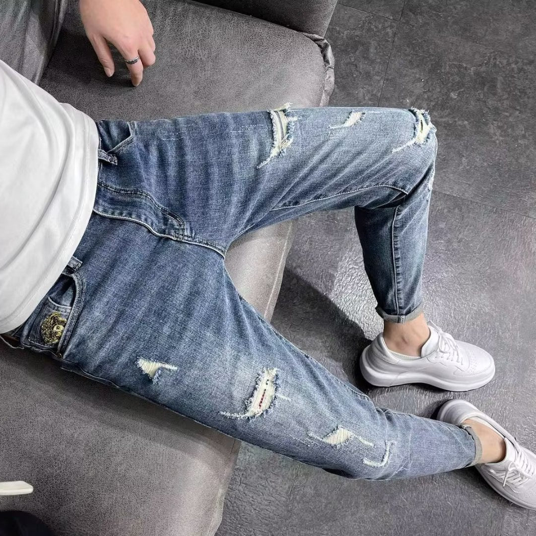 Jeans strappati skinny da uomo a vita alta elasticizzati ideali per la primavera e l'autunno