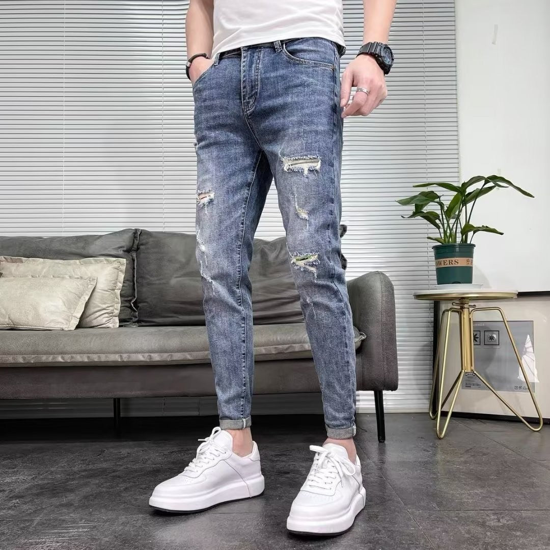 Jeans strappati skinny da uomo a vita alta elasticizzati ideali per la primavera e l'autunno