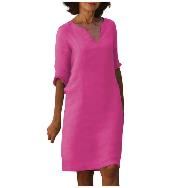 Abito rosa fucsia da donna, maniche a tre quarti, scollo a V, stile casual elegante. Perfetto per moda estiva e look quotidiano.