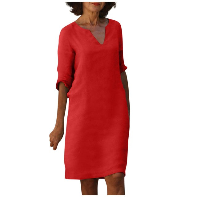 Abito rosso elegante da donna, maniche a tre quarti, scollo a V, stile casual chic, perfetto per eventi e serate.