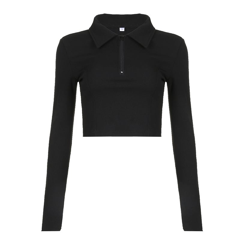Maglia nera a maniche lunghe con zip frontale e colletto, design moderno e aderente, ideale per moda autunnale e look casual chic.
