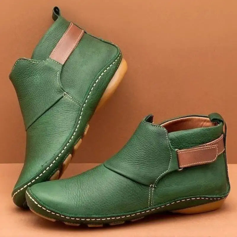 Scarpe uomo in pelle verde, design casual, suola antiscivolo, cuciture a vista, chiusura elastica, stile moderno, comfort quotidiano.