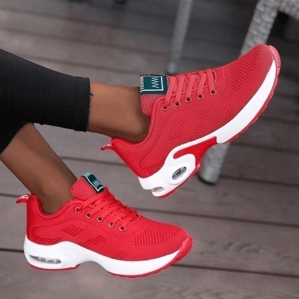 Scarpe da ginnastica rosse da donna, design moderno con suola bianca ammortizzata, perfette per sport e tempo libero. Sneakers moda comode e trendy.