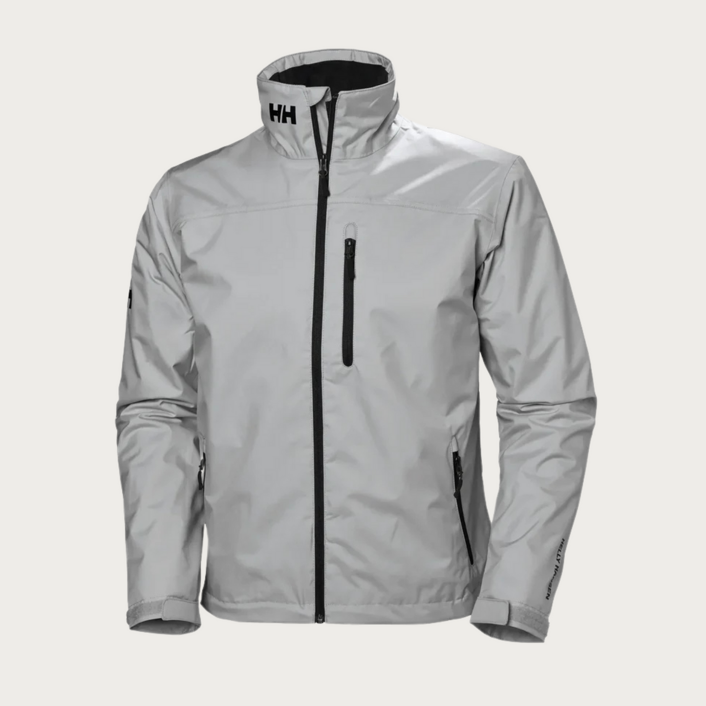 Giacca impermeabile Helly Hansen bianca, con zip frontale nera e tasche laterali. Design sportivo, ideale per attività outdoor e tempo libero.