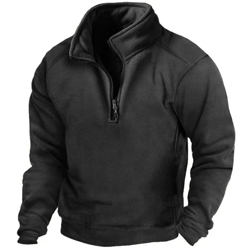 Felpa nera in pile con zip corta, design casual e sportivo, ideale per l'inverno. Abbigliamento caldo e confortevole per uomo.