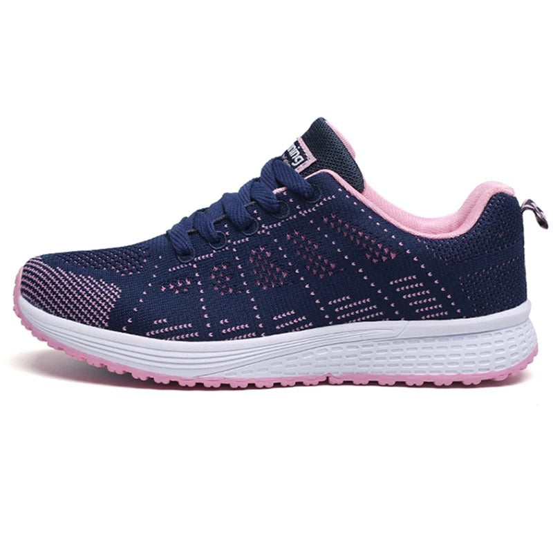 Scarpa da ginnastica blu e rosa per donna, design traspirante, suola in gomma bianca, ideale per corsa e sport. Scarpe sportive leggere e comode.