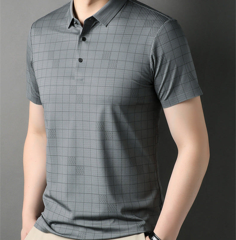 Maglietta polo grigia a quadri per uomo, maniche corte, stile casual elegante, tessuto leggero, perfetta per look estivi e primaverili.