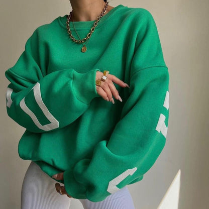 Langærmet dame top med print og rund hals