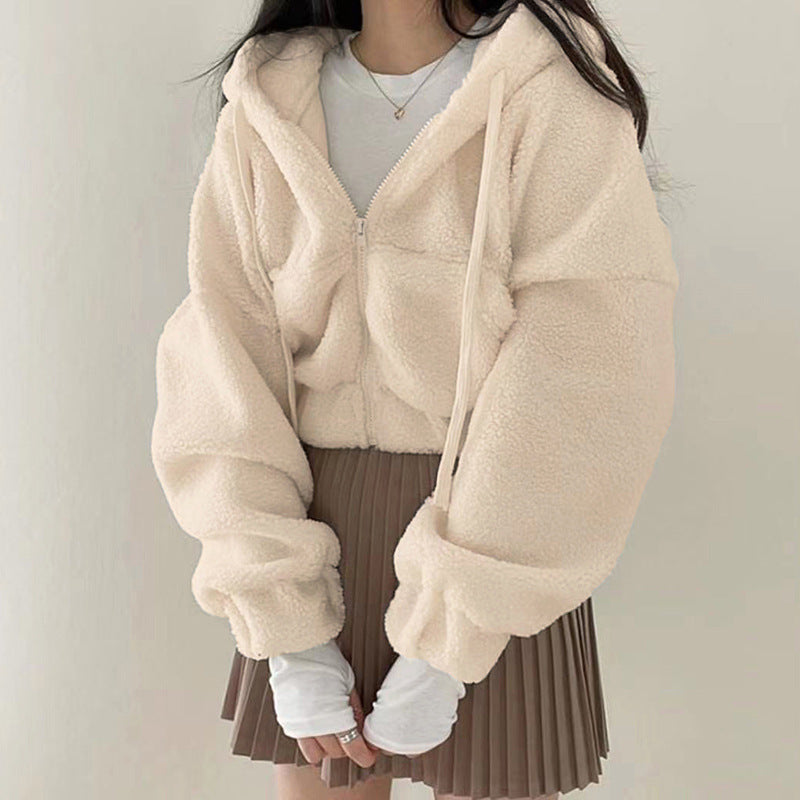 Chaqueta de invierno corta para mujer en lana de cordero con cuello alto