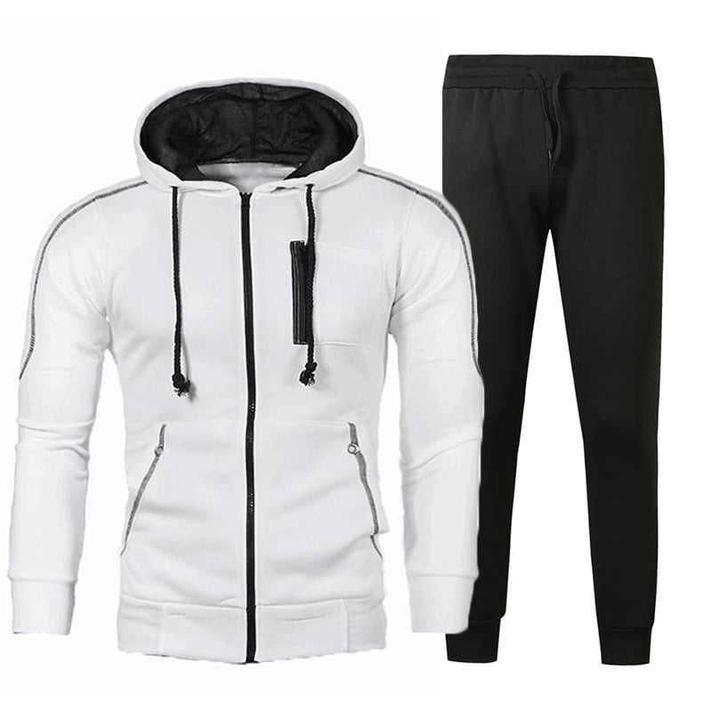 Tuta sportiva uomo, felpa bianca con cappuccio e pantaloni neri, zip frontale, tasche laterali, abbigliamento casual, moda fitness.