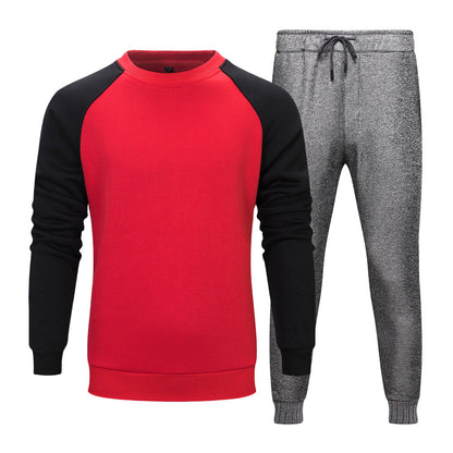 Set tuta uomo: felpa rossa con maniche nere e pantaloni grigi. Abbigliamento sportivo casual, comodo e alla moda per attività quotidiane.