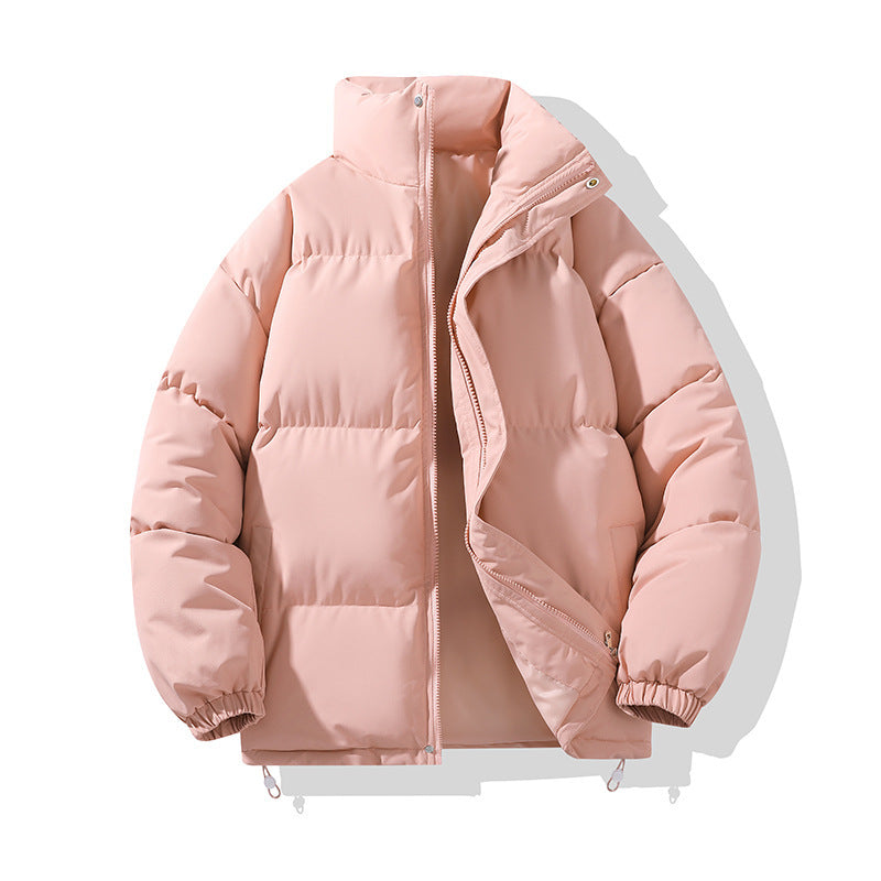 Giacca invernale imbottita rosa chiaro, design trapuntato, chiusura con zip, polsini elasticizzati, ideale per moda donna e abbigliamento caldo.