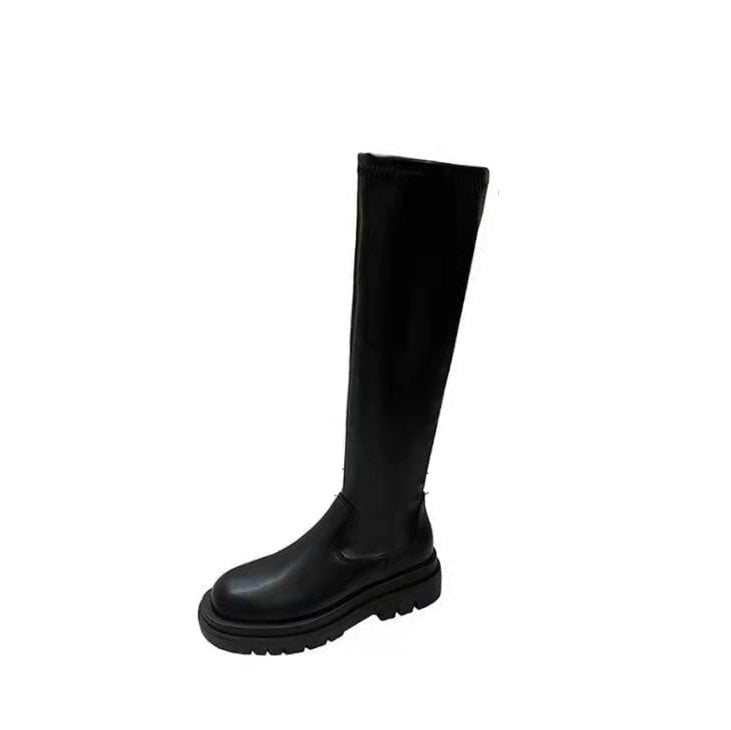 Stivale nero in pelle, design alto al ginocchio, suola spessa. Calzature moda autunno inverno, stile elegante e moderno.