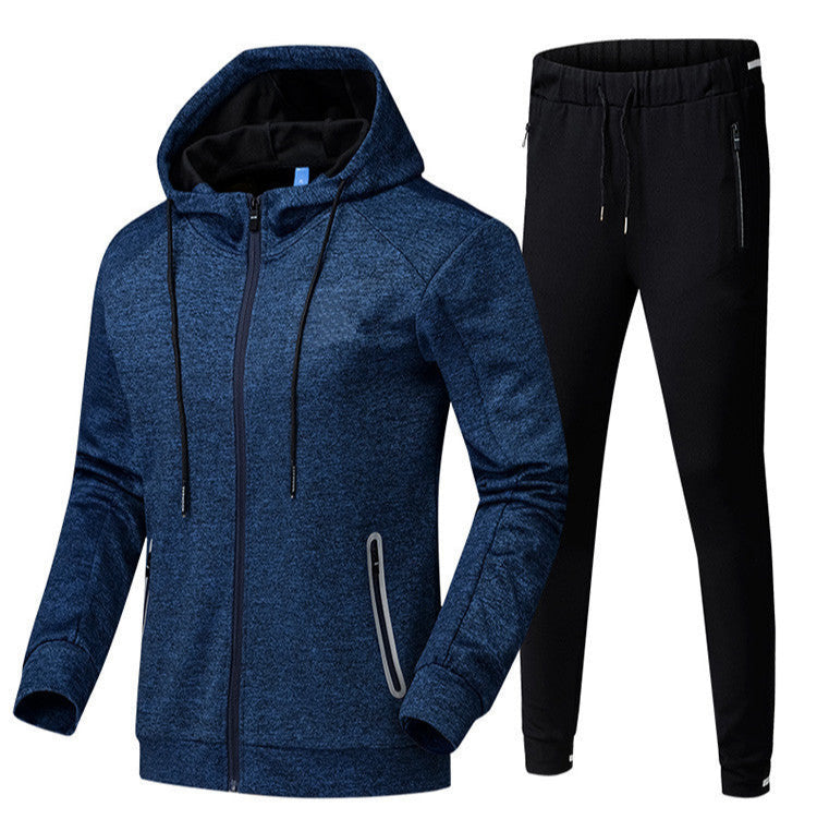 Tuta sportiva uomo, giacca blu con cappuccio e pantaloni neri. Abbigliamento fitness, casual, comodo, ideale per palestra e attività all'aperto.