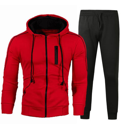Tuta sportiva uomo, felpa rossa con cappuccio e pantaloni neri. Abbigliamento casual, moda fitness, stile moderno, comodo e versatile.