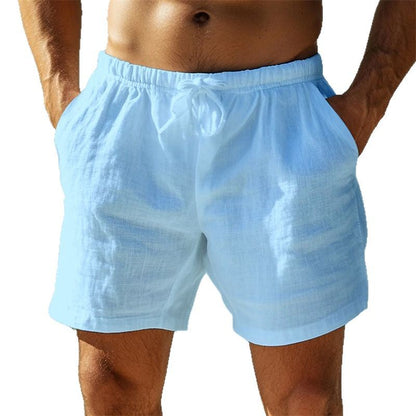 Pantaloncini da uomo in lino azzurro, stile casual estivo, con tasche e laccio in vita. Ideali per spiaggia e tempo libero.