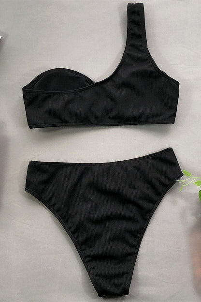Bikini monospalla imbottito con slip a vita alta