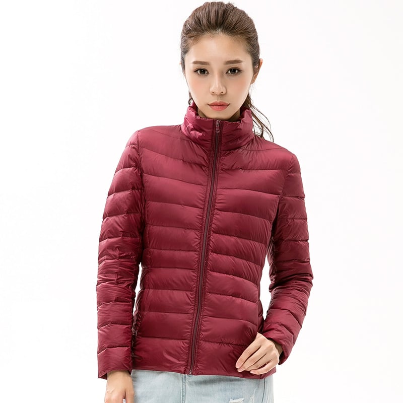 Chaqueta primaveral ligera para mujer acolchada con cuello alto y cierre de cremallera