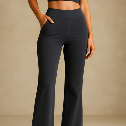 Pantaloni a zampa neri da donna, eleganti e moderni, con tasche laterali. Ideali per moda casual e abbigliamento quotidiano.