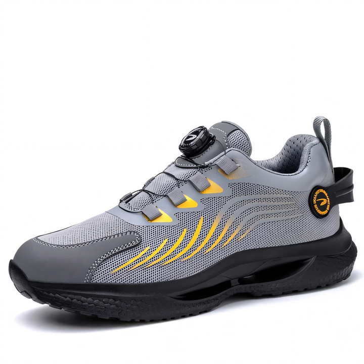 Scarpa sportiva grigia con dettagli gialli, suola nera antiscivolo, chiusura a rotella, design moderno e traspirante, ideale per attività outdoor.