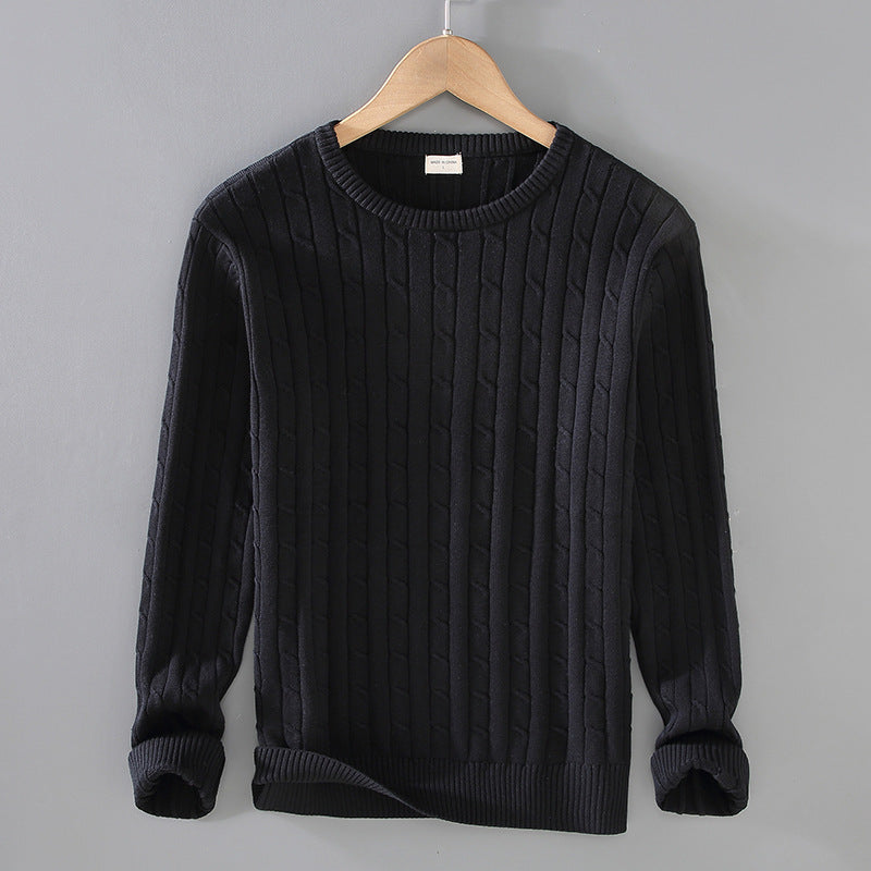 Maglione nero a trecce su gruccia, design classico, maniche lunghe, ideale per moda autunnale e invernale, abbigliamento casual elegante.
