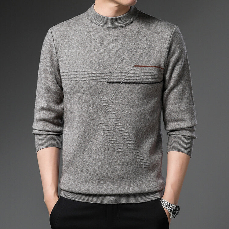 Maglione grigio uomo, design moderno con dettagli geometrici, collo alto, maniche lunghe. Moda maschile elegante, abbigliamento autunnale.