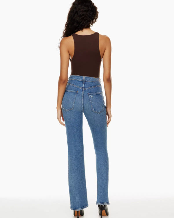 Jeans de mujer en denim de pierna recta y cintura alta con rotos