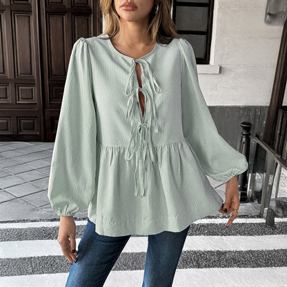 Camisa de mujer de rayas con mangas largas, nudo frontal y mangas farol