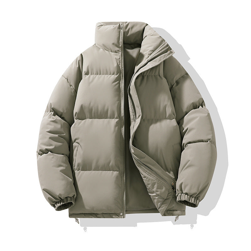 Giacca invernale imbottita beige, design trapuntato, chiusura con zip, colletto alto, ideale per moda uomo, abbigliamento caldo e casual.