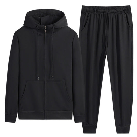 Tuta sportiva nera da uomo, composta da felpa con cappuccio e pantaloni, ideale per allenamento e tempo libero. Design moderno e confortevole.