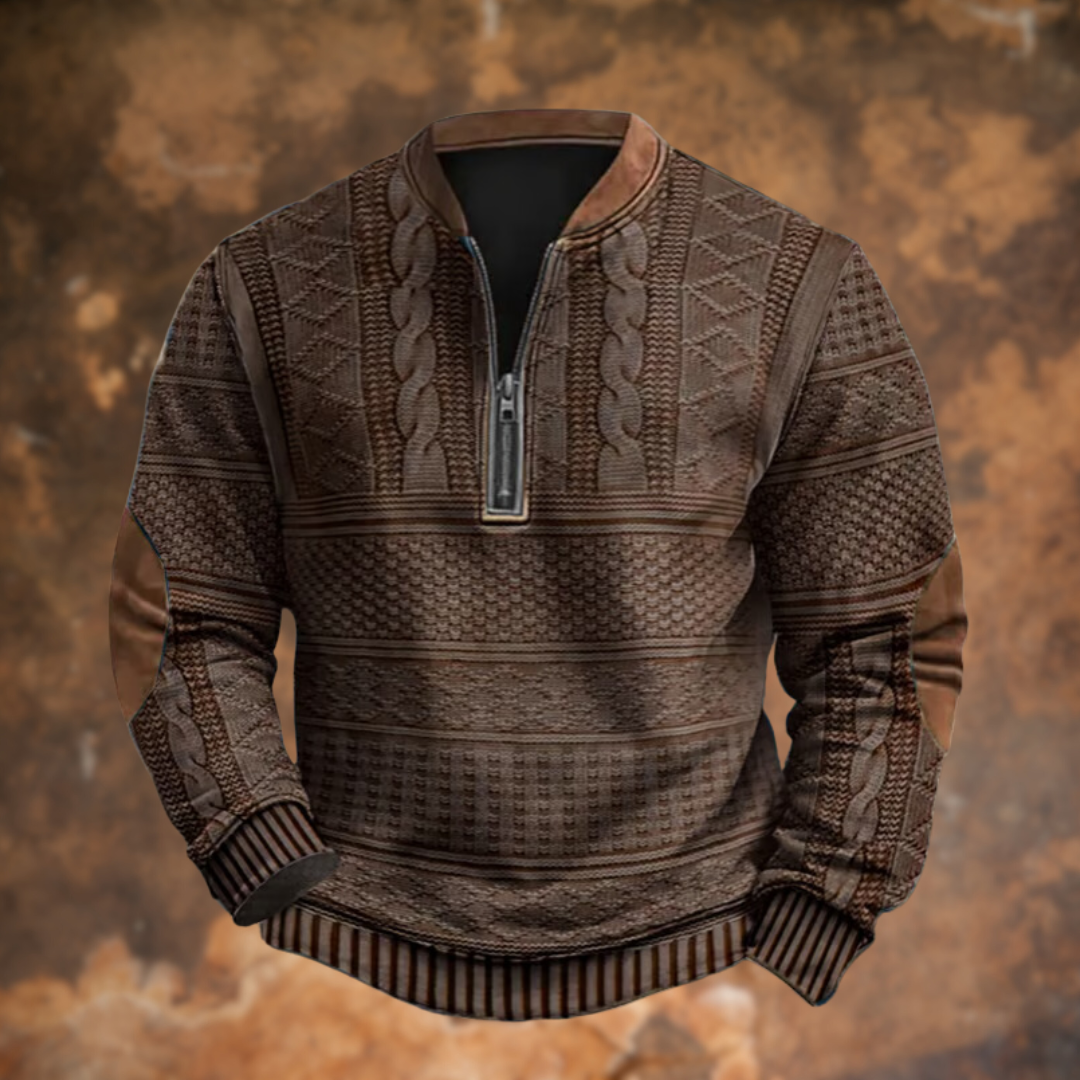 Maglione marrone in maglia con zip, motivo intrecciato e dettagli in pelle su sfondo marrone. Elegante e caldo, ideale per l'inverno.