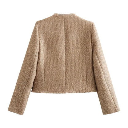 Giacca donna beige in lana, taglio classico, vista posteriore. Elegante e versatile, ideale per look autunnali e invernali.