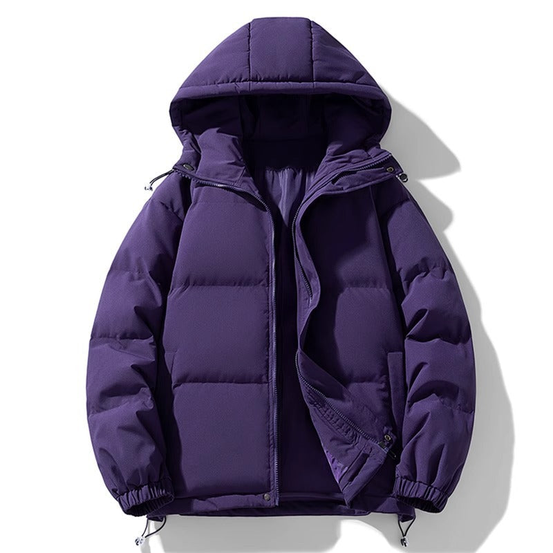 Giacca invernale viola con cappuccio, imbottita e trapuntata, ideale per il freddo. Design moderno, chiusura a zip, tasche laterali.