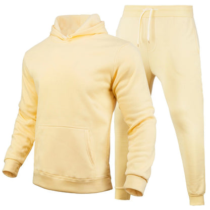 Tuta sportiva gialla unisex, composta da felpa con cappuccio e pantaloni con tasche. Abbigliamento casual, comodo e alla moda per tutte le stagioni.