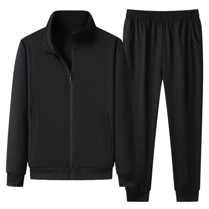 Tuta sportiva nera da uomo, giacca con zip e pantaloni elasticizzati, abbigliamento casual, moda fitness, tessuto traspirante, stile moderno.