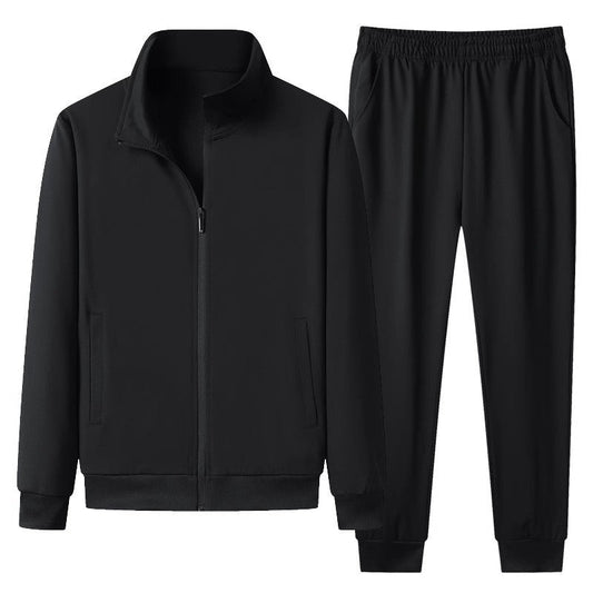 Tuta sportiva nera da uomo, giacca con zip e pantaloni elasticizzati, abbigliamento casual, moda fitness, tessuto traspirante, stile moderno.