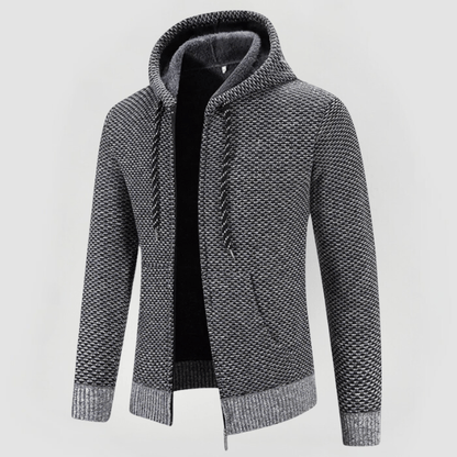 Felpa con cappuccio grigia in maglia, design moderno, chiusura a zip, tessuto intrecciato, ideale per moda casual e abbigliamento autunnale.