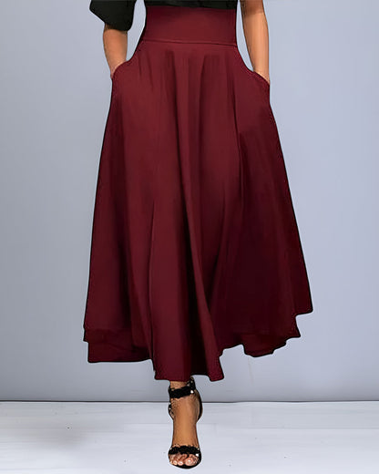 Gonna lunga bordeaux elegante, a vita alta, con tasche laterali. Perfetta per moda donna, abbigliamento casual chic, stile autunnale.