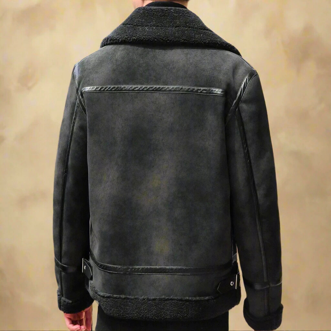 Giacca in pelle nera da uomo vista posteriore, stile aviatore, con colletto in shearling, design elegante e moderno, moda invernale.