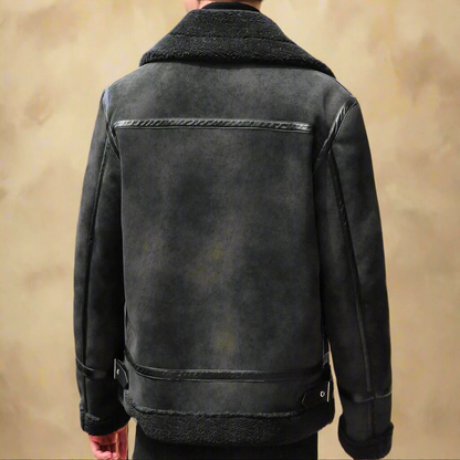 Giacca in pelle nera da uomo vista posteriore, stile aviatore, con colletto in shearling, design elegante e moderno, moda invernale.