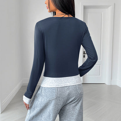 Top til kvinder med lange ærmer, slim fit, rund halsudskæring og falsk todelt design